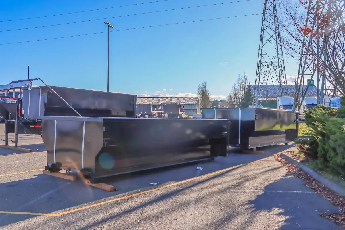Roll-off dumpster ready for waste disposal at job site for Concrete Dumpster Rental in Fort Mitchell